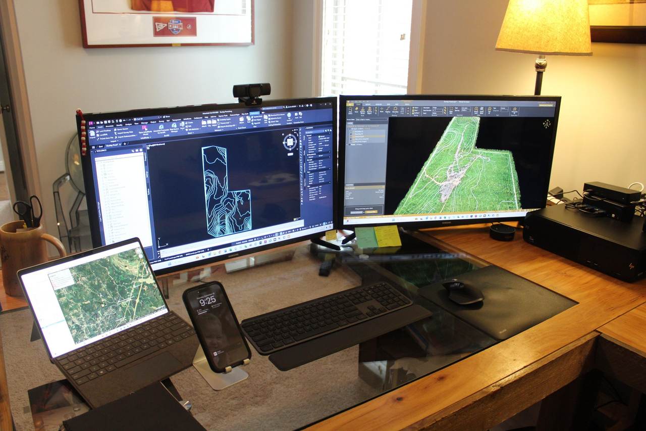 In-house drone data processing software on workstation screens